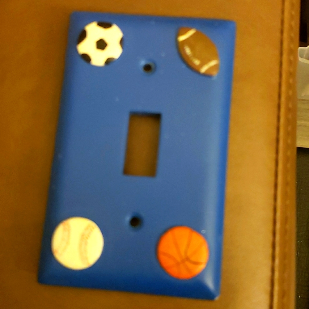 Sport ball light switch cover.